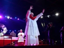 Pope Benedict waves to the youth at the Evening Vigil