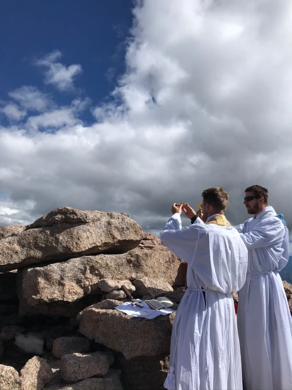 Father John Nepil of the Archdiocese of Denver (left) celebrates Mass on top of Mount Yale near Buena Vista, Colorado, with Father Sean Conroy of the Archdiocese of Denver. Credit: Photo courtesy of Father John Nepil