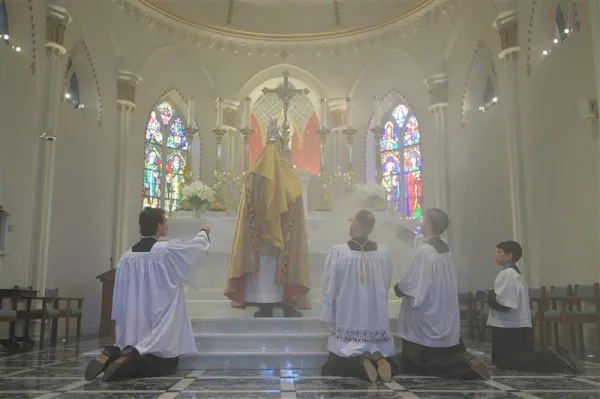 Father Albert Scharbach, pastor of Mount Calvary Catholic Church in Baltimore, elevates the holy Eucharist on the feast of Corpus Christi, May 30, 2024. Scharbach told CNA that “families need to be fed spiritually, that’s the priority.” Credit: Photo courtesy of Mount Calvary Catholic Church