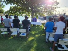 Catholics attend Mass via the Apostleship of the Sea Ministry in Honolulu, Saturday, Dec. 21, 2024.