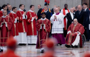 Pope Francis arrives at the Liturgy of the Lord’s Passion in St. Peter's Basilica on Good Friday on April 7, 2023. Credit: Daniel Ibanez/CNA