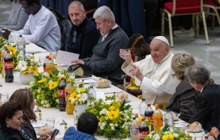 Pope Francis raises his glass at the start of a lunch with poor and economically disadvantaged people in the Vatican's Paul VI Hall on Nov. 19, 2023. Credit: Daniel Ibanez/CNA