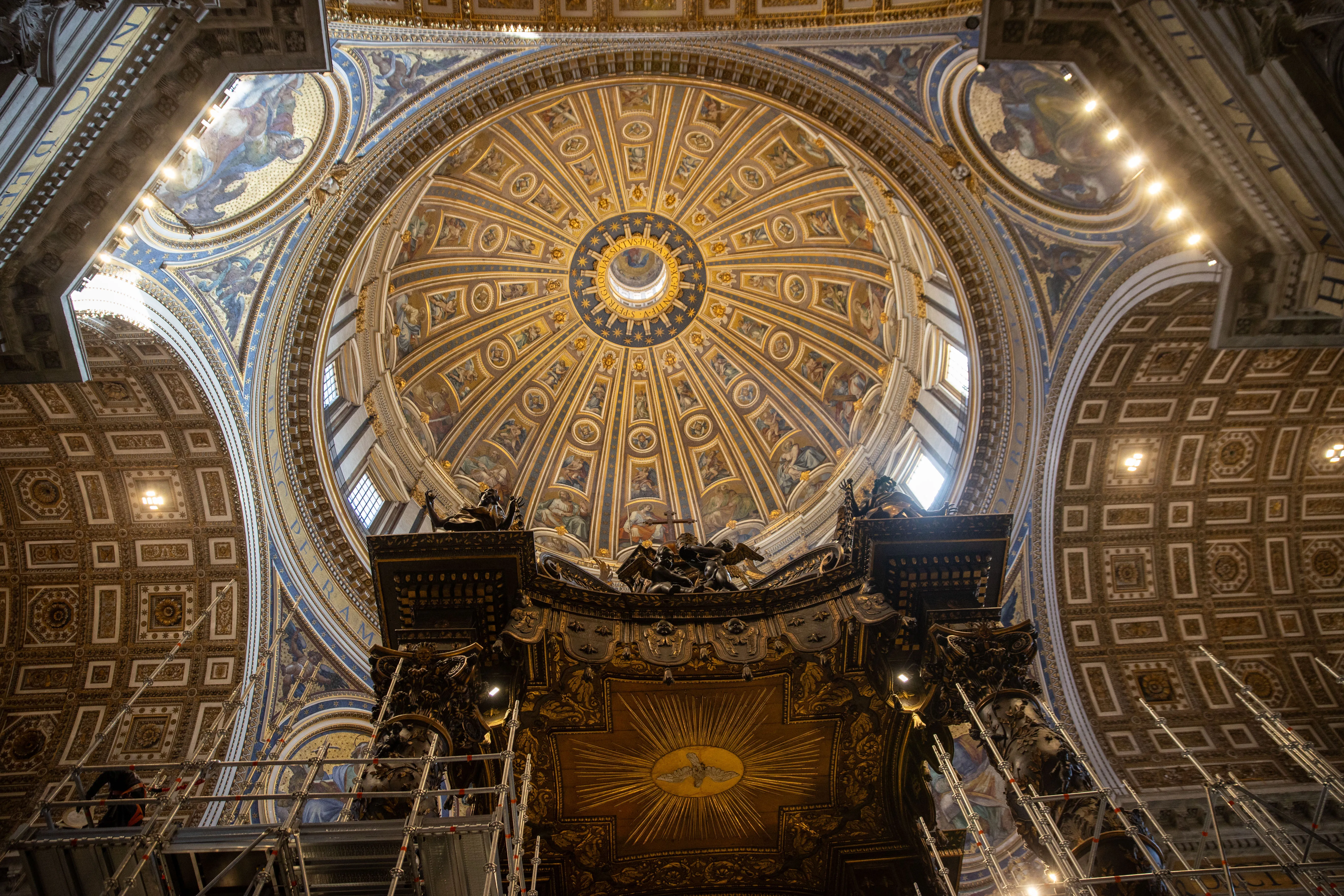 A view of the baldacchino underneath the central dome of St. Peter's Basilica.?w=200&h=150