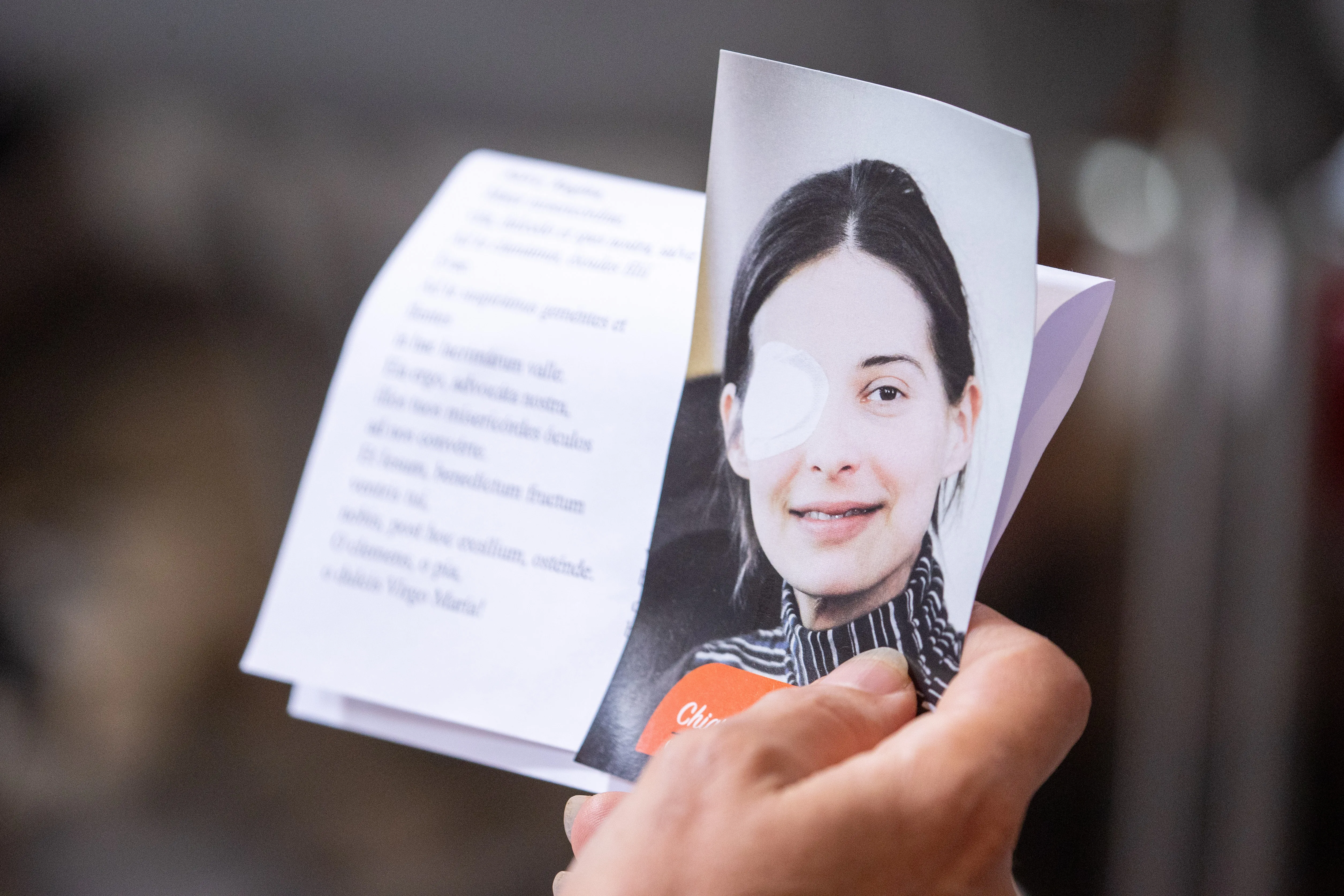 An attendee holds a photo of Chiara Corbella Petrillo at the closing of the diocesan phase of the investigation into her life and virtues in Rome on Friday, June 21, 2024.?w=200&h=150