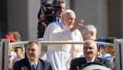 Pope Francis waves to pilgrims at his General Audience in St. Peter's Square at the Vatican, Wednesday, June 26, 2024