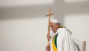 Pope Francis prays during Mass at King Baudouin Stadium in Brussels, Belgium, Sunday, Sept. 29, 2024