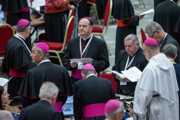 Participants read prayers during the first meeting of the full assembly of the Synod on Synodality on Oct. 2, 2024. Credit: Daniel Ibañez/CNA