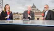 Cardinal Michael Czerny, S.J., with Catherine Hadro and Matthew Bunson on the set of EWTN News live from the Synod on Synodality in Rome, Oct. 24, 2024.