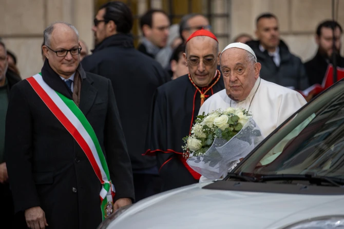 Pope Francis arrives with flower