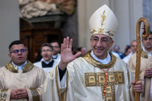 Cardinal Baldassare Reina waves at the faithful gathered for Mass at the Basilica of St. John Lateran in Rome, Dec. 29, 2024. Credit: Daniel Ibáñez/CNA