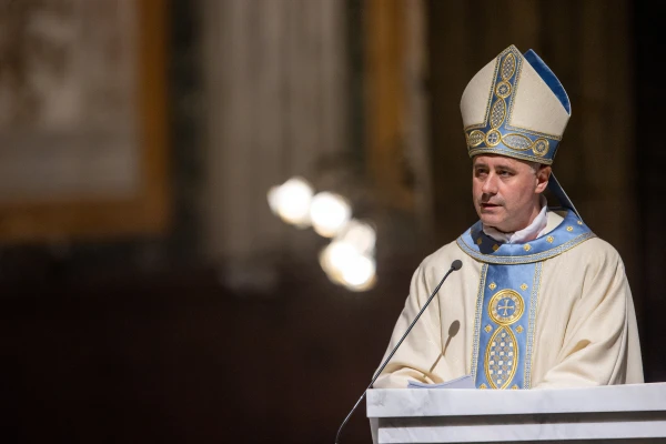 Cardinal Rolandas Makrickas, wearing Marian blue and cream vestments, delivers the homily during the Mass opening the Jubilee Year at Rome's Basilica of St. Mary Major on Jan. 1, 2025. Credit: Daniel Ibáñez/CNA