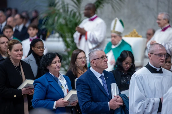 Newly installed lectors from 11 countries hold liturgical books during the Jan. 26, 2025, Word of God Sunday Mass at St. Peter's Basilica. Credit: Daniel Ibáñez/CNA