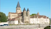 Roman Basilica of the Sacred Heart of Paray-le-Monial and cloister. View from the Bourbince River, 2023.