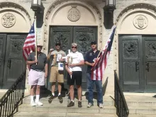 A handful of LOFRON resolution members stand outside of the Cathedral of St. Mary of the Assumption in Trenton, New Jersey. It was here where they recited the Prayer of Consecration of America to the Immaculate Heart of Mary on July 4, 2022.
