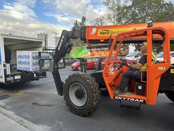 A forklift loader handles supplies at Immaculata Catholic School in Hendersonville, North Carolina, October 2024. Credit: Immaculata Catholic School