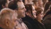 Attendees listen to a panel discussion at the New York Encounter in 2024.