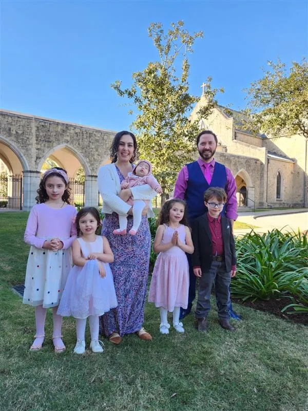 Luke and Paula Stuckey and their five children stand outside the Cathedral of Our Lady of Walsingham after Easter Mass. The Stuckeys have been parishioners of Our Lady of Walsingham since 2020. “The first thing that really made us fall in love with Walsingham was regular confession that was easy to get to,” Luke Stuckey explained. “Every Saturday, every Sunday, and multiple times throughout the week.” Credit: Photo courtesy of Luke Stuckey