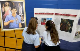 School children read about the life of Blessed Carlo Acutis at the celebration of his new shrine at St. Dominic Parish in Brick, New Jersey. Oct, 1, 2023. Credit: Thomas P. Costello II