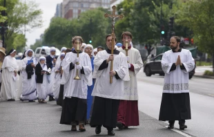 A few hundred Catholics marched through the streets of Washington, D.C., to publicly pray and adore the body of Christ during a eucharistic procession on Saturday, May 20, 2023. Credit: Joe Portolano/CNA