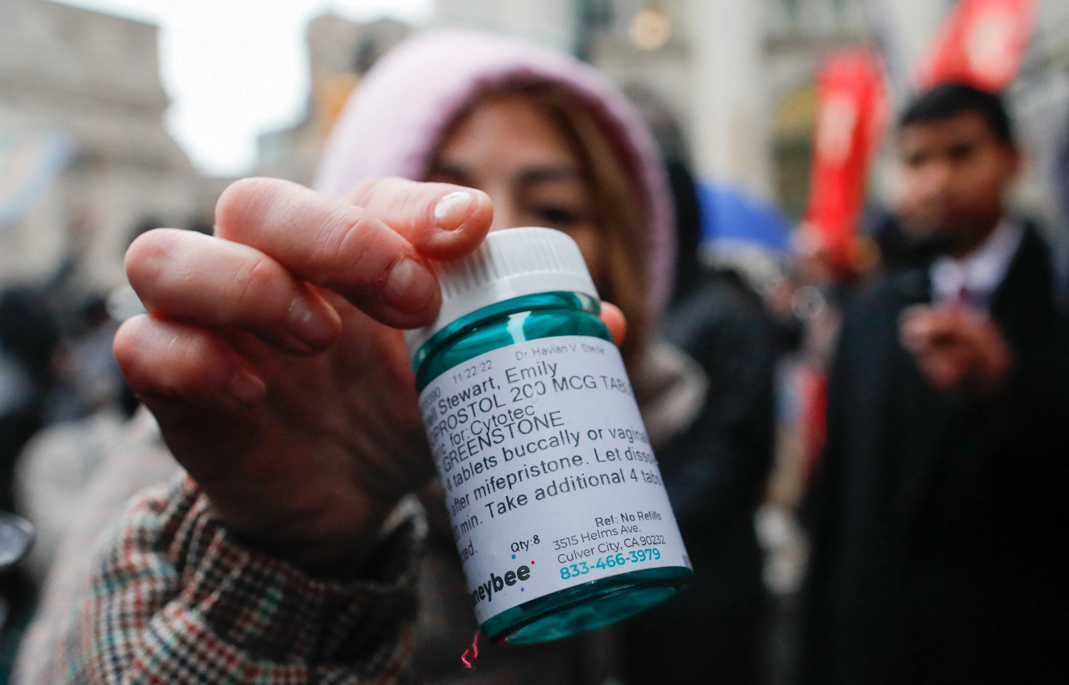 A pro-abortion activist displays abortion pills as she counter-protests during a pro-life rally on March 25, 2023, in New York City.?w=200&h=150