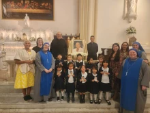 The inaugural class at Saint John Paul the Great Academy with staff and the Servidoras in New York City.