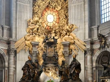 Altar of the Chair in St. Peter's Basilica, where Bernini's gorgeous bronze monument to the Chair of Peter acts as a massive
bronze reliquary for the historic wooden chair.