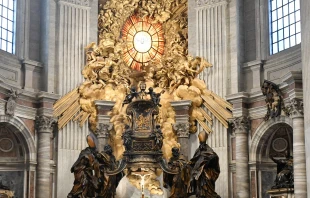 Altar of the Chair in St. Peter's Basilica, where Bernini's gorgeous bronze monument to the Chair of Peter acts as a massive
bronze reliquary for the historic wooden chair. Credit: Vatican Media