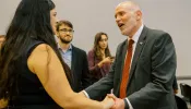 Peter Sonski, presidential candidate for the American Solidarity Party, greets a fellow presidential candidate,  pro-life Democrat Terrisa Bukovinac, following a speech at the Catholic University of America.