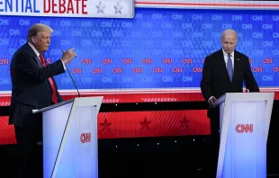 President Joe Biden, right, listens as Republican presidential candidate former President Donald Trump speaks during a presidential debate hosted by CNN, Thursday, June 27, 2024, in Atlanta. Credit: AP Photo/Gerald Herbert