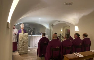 Archbishop Georg Gänswein celebrates Mass in the Vatican crypt close to the tomb of Pope Benedict XVI on Jan. 31, 2023, to mark one month since the death of the pope emeritus on Dec. 31, 2022. Angela Ambrogetti/CNA