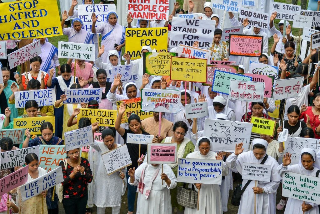 Members representing Assam Christian Forum and CRI-NEI in India take part in a solidarity prayer meeting for restoration of peace in Manipur after ethnic violence at a school in Guwahati on June 24, 2023.?w=200&h=150