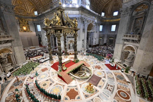 More than 300 priests and bishops, 70 cardinals, and nine patriarchs concelebrated the Synod on Synodality’s closing Mass on Oct. 27, 2024, under the canopy of the recently restored 400-year-old intricate bronze canopy baldacchino designed by Gian Lorenzo Bernini, which was revealed at the Mass for the first time since restoration. Credit: Vatican Media