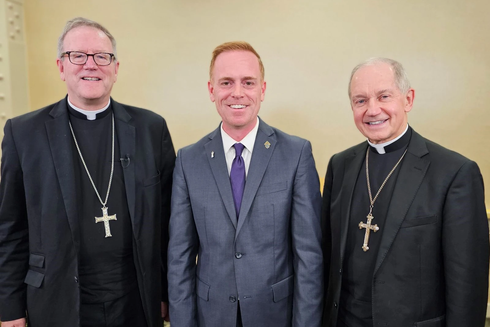 Bishop Robert Barron of Winona-Rochester, left, and Bishop Thomas Paprocki of Springfield, Illinois, with Andrew Hansen, director of communications for the Diocese of Springfield in Illinois.?w=200&h=150