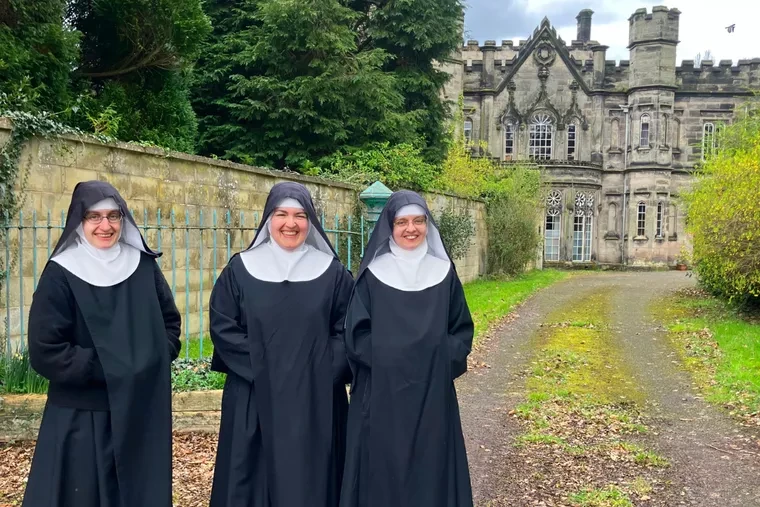 Three Benedictine Sisters of Mary, Queen of Apostles, are all smiles at Colwich Abbey in Staffordshire, England.?w=200&h=150