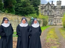 Three Benedictine Sisters of Mary, Queen of Apostles are all smiles at Colwich Abbey in Staffordshire, England.