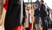 Bishop Jacques Habert of the Diocese of Bayeux and Lisieux in France greets Britain’s Princess Anne (right) on June 5, 2024, as she arrives to attend the Commonwealth War Graves Commission’s annual service of remembrance at Bayeux Cathedral in Bayeux, Normandy, northwestern France, as part of the events to mark the 80th anniversary commemorations of Allied amphibious landing (D-Day landings) in France in 1944.