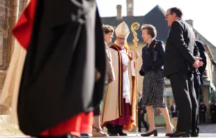 Bishop Jacques Habert of the Diocese of Bayeux and Lisieux in France greets Britain’s Princess Anne (right) on June 5, 2024, as she arrives to attend the Commonwealth War Graves Commission’s annual service of remembrance at Bayeux Cathedral in Bayeux, Normandy, northwestern France, as part of the events to mark the 80th anniversary commemorations of Allied amphibious landing (D-Day landings) in France in 1944. Credit: AARON CHOWN/POOL/AFP via Getty Images