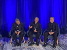 USCCB president Archbishop Timothy Broglio (left); Bishop Mark Seitz, head of the USCCB migration committee (center); and Bishop Michael Burbidge, chairman of the USCCB’s pro-life committee, speak to media at the USCCB fall plenary assembly on Nov. 12, 2024.  