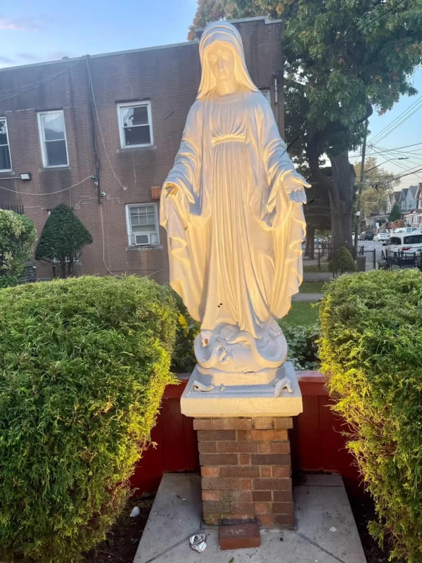 A statue of the Blessed Mother is seen vandalized at the St. Therese of Lisieux Roman Catholic Church after an incident on Tuesday, Oct. 22, 2024, in Brooklyn, New York. Credit: St. Therese of Lisieux Roman Catholic Church