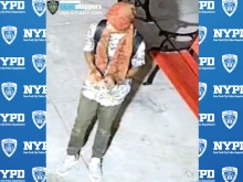 The suspect who allegedly vandalized statues at the St. Therese of Lisieux Roman Catholic Church in Brooklyn is seen in footage on Tuesday, Oct. 22, 2024.