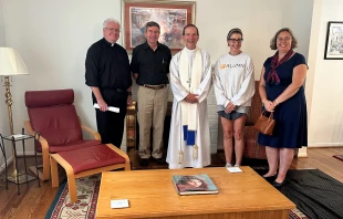 Bishop Michael Burbidge of Arlington, Virginia (center), at his blessing of Mary’s Comfort maternity home on Aug. 9, 2024. More maternity homes are popping up across the United States to house and support pregnant mothers and their babies since Roe v. Wade was overturned by the U.S. Supreme Court in 2022.  Credit: Mary’s Comfort