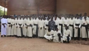 Recently arrived seminarians in Burkina Faso with new cassocks.