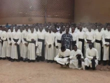 Recently arrived seminarians in Burkina Faso with new cassocks.