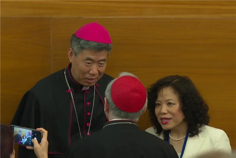 Shanghai Bishop Shen Bin speaks to Vatican Secretary of State Cardinal Pietro Parolin at a Vatican conference on Wednesday, May 22, 2024.?w=200&h=150