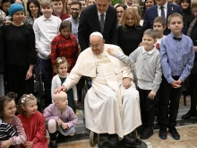 Pope Francis greets young cancer patients who are on pilgrimage from Poland to Rome during a Jan. 10, 2025, audience at the Vatican.