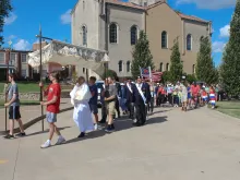 Hundreds of people joined as the Eucharist left the Shrine of St. Rose Philippine Duchesne, headed for St. Peter Parish, in St. Charles, Missouri.
