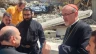 The Latin patriarch of Jerusalem, Cardinal Pierbattista Pizzaballa, speaks with Father Gabriel Romanelli, pastor of Holy Family Church, during his December 2024 visit to Gaza.