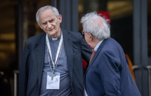 Cardinal Matteo Zuppi (left) arrives at the Vatican for Synod on Synodality meetings on Oct. 10, 2024. The Vatican announced on Monday, Oct. 14, that the cardinal returned to Moscow to meet with Russian authorities as part of the peace mission entrusted to him by Pope Francis. Credit: Daniel Ibañez/CNA