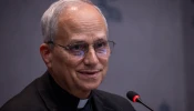 Cardinal Robert Prevost speaks to members of the media during a Synod on Synodality briefing on Oct. 23, 2024, at the Vatican.