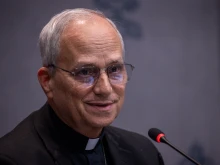 Cardinal Robert Prevost speaks to members of the media during a Synod on Synodality briefing on Oct. 23, 2024, at the Vatican.